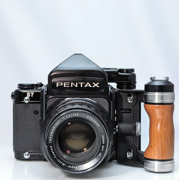 Pentax 67 SLR mirror up film camera w/Super -multi-coated Takumar 105mm  f2.4 lens, and grip