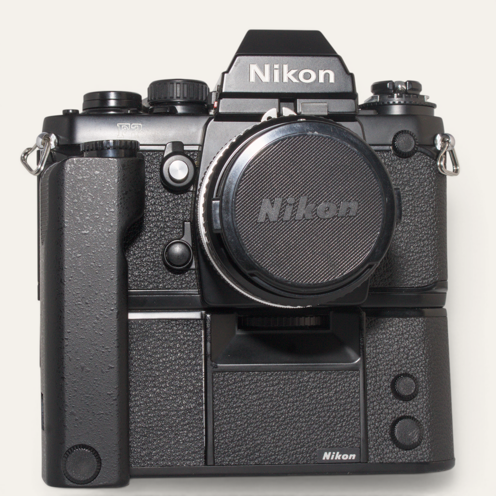 Title
Nikon F3 35mm SLR Camera w/ MD-4 Motor Drive &amp; Nikkor 50mm f/1.8 AI Lens – Used – Excellent Plus
