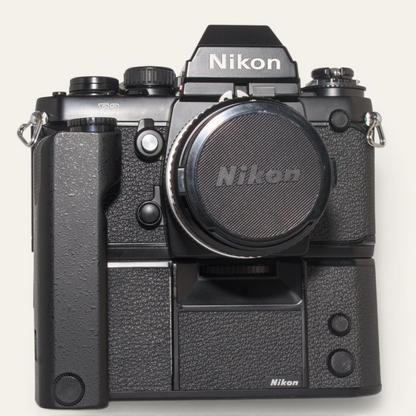 Title
Nikon F3 35mm SLR Camera w/ MD-4 Motor Drive &amp; Nikkor 50mm f/1.8 AI Lens – Used – Excellent Plus
