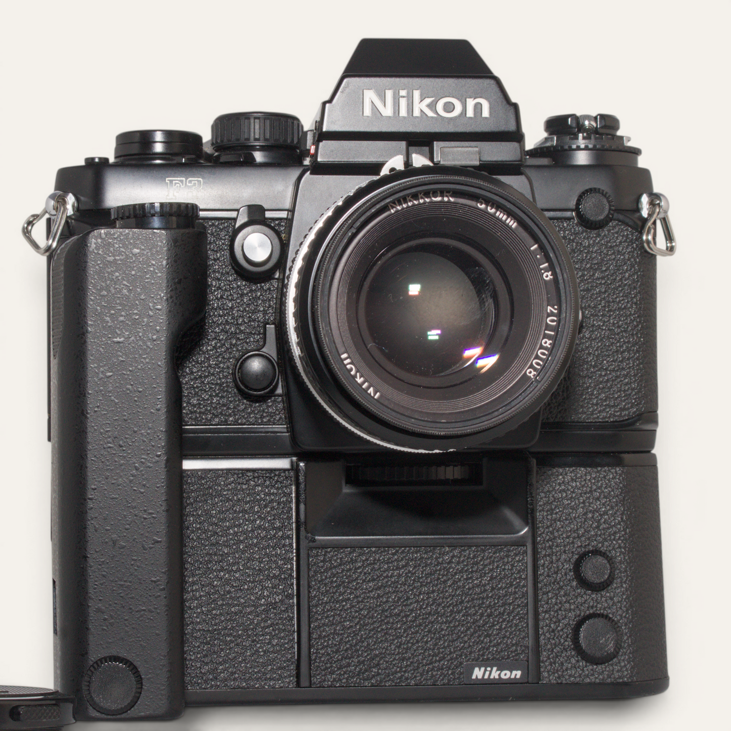 Title
Nikon F3 35mm SLR Camera w/ MD-4 Motor Drive &amp; Nikkor 50mm f/1.8 AI Lens – Used – Excellent Plus
