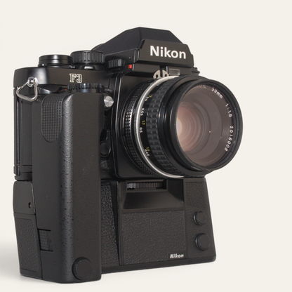 Title
Nikon F3 35mm SLR Camera w/ MD-4 Motor Drive &amp; Nikkor 50mm f/1.8 AI Lens – Used – Excellent Plus
