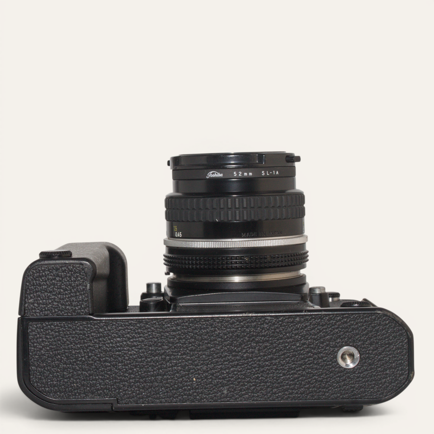 Title
Nikon F3 35mm SLR Camera w/ MD-4 Motor Drive &amp; Nikkor 50mm f/1.8 AI Lens – Used – Excellent Plus
