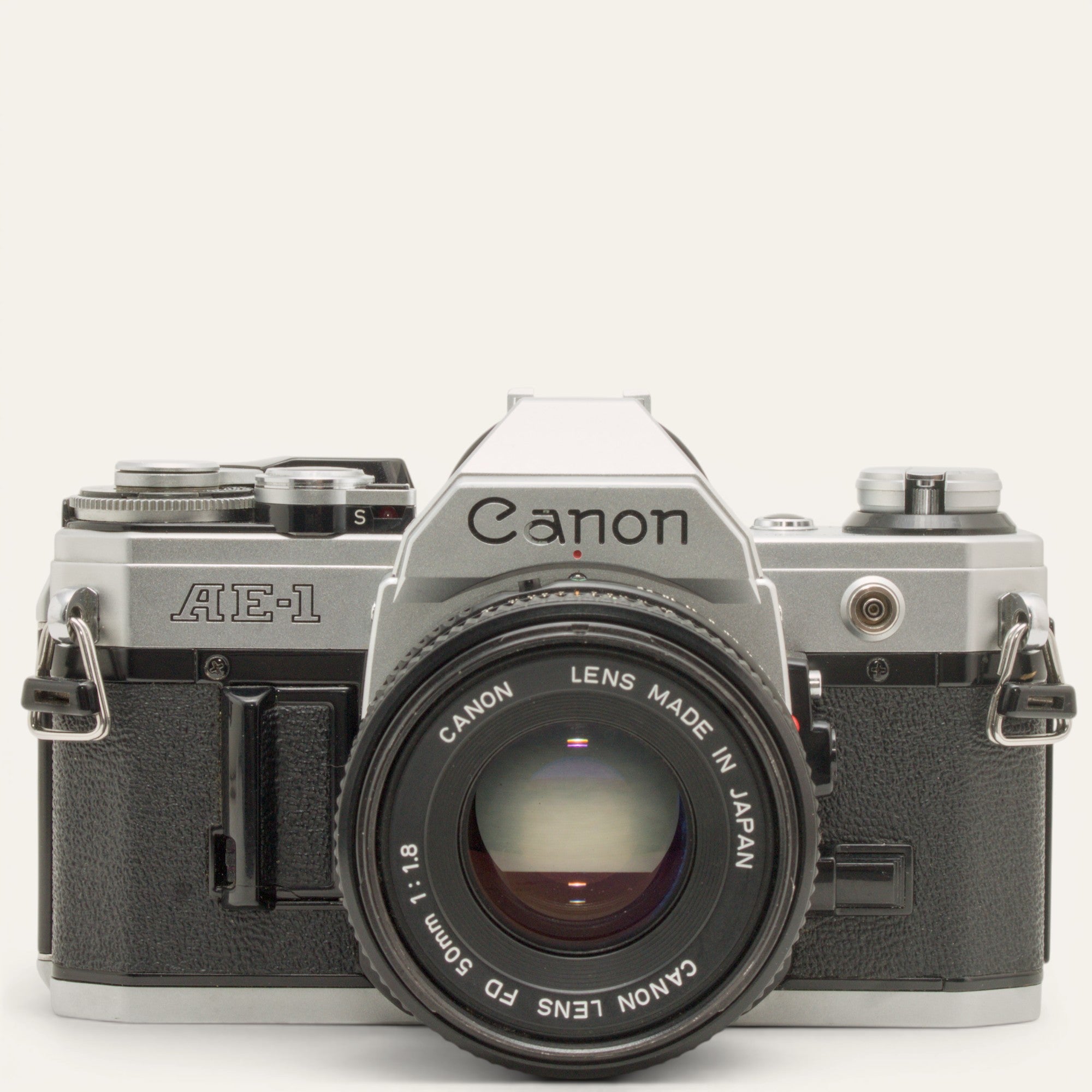 Canon AE-1 35mm SLR Camera with New FD 50mm f/1.8 Lens – Camera