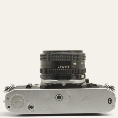 Canon AE-1 35mm SLR Camera with New FD 50mm f/1.8 Lens