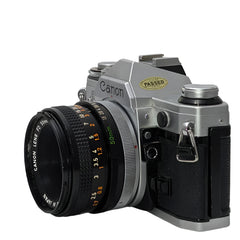 Canon AE-1 35mm film SLR camera w/ 50mm f1.8 Canon FD lens.