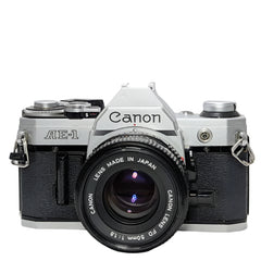 Canon AE-1 35mm film SLR camera w/ Canon New FD 50mm f1.8 lens