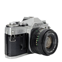 Canon AE-1 35mm film SLR camera w/ Canon New FD 50mm f1.8 lens