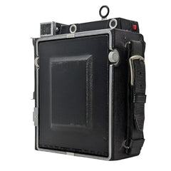 Pacemaker Graflex Crown Graphic Special 4x5 film camera with Schneider-Kreuznach 135mm f4.7 Xenar lens and flash unit